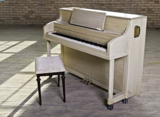 A piano that has been moved and is waiting to be tuned